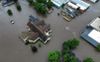 Luchtfoto van de Netherlands Reformed Congregation in Rock Valley (Iowa, Verenigde Staten), na een overstroming eind juni. De kerk heeft geen relatie met het nieuwsbericht. beeld Chris van Beek