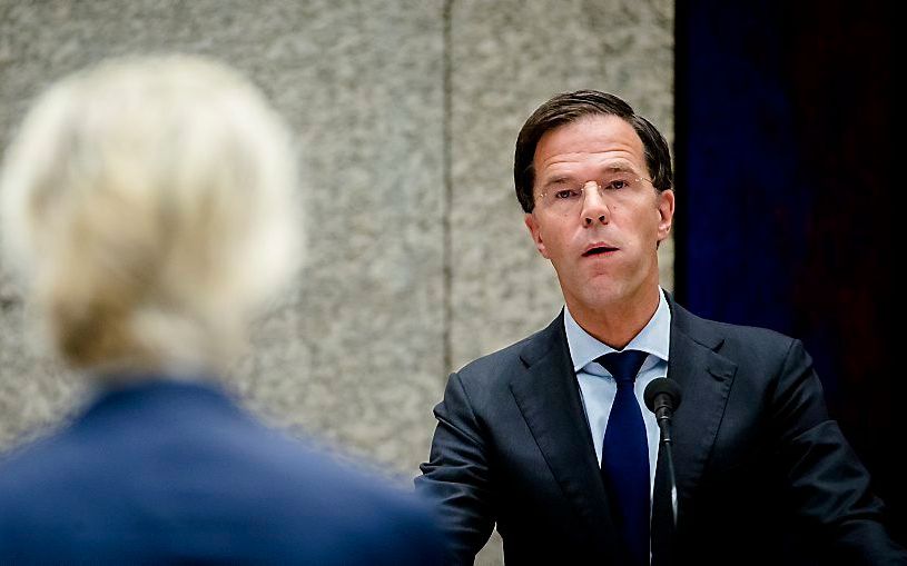 Rutte (r.) tegenover Wilders. beeld ANP