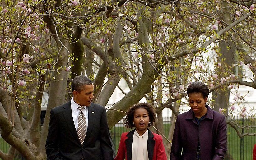 Barack Obama, zijn echtgenote Michelle en dochter Sasha. Foto EPA