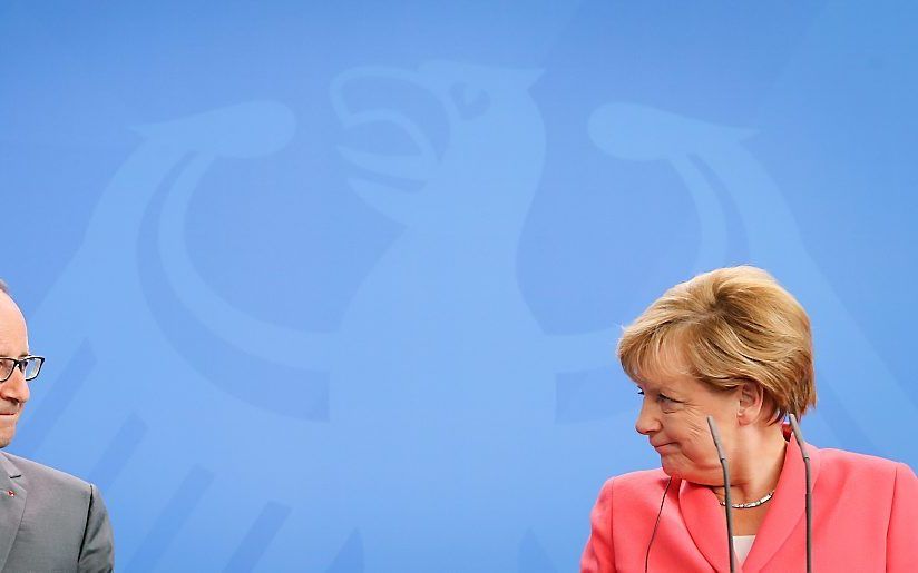 De Duitse bondskanselier Angela Merkel en de Franse president François Hollande. beeld EPA