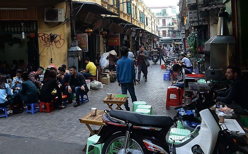 De vervolging van christenen in Vietnam houdt aan. Foto: een straatbeeld in de hoofdstad Hanoi.  beeld AFP