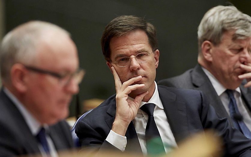 Minister Timmermans van Buitenlandse Zaken, premier Rutte en minister Opstelten van Veiligheid en Justitie tijdens het Tweede Kamerdebat over de militaire bijdrage van Nederland aan de internationale strijd tegen IS. beeld ANP