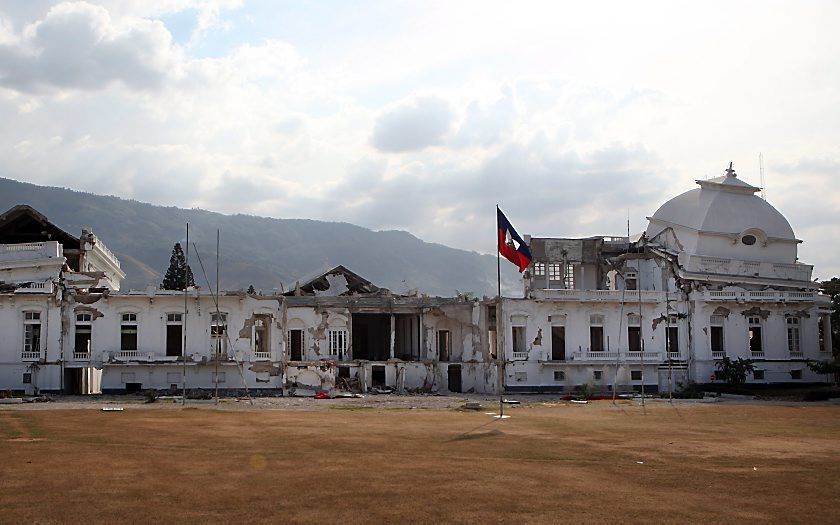 PORT-AU-PRINCE – Het presidentieel paleis in de Haïtiaanse hoofdstad Port-au-Prince ligt nog altijd in puin. Vandaag is het precies twee jaar geleden dat het land door een verwoestende aardbeving werd getroffen.Foto EPA