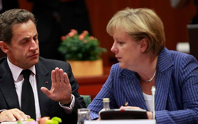 Sarkozy (l.) en Merkel. Foto EPA