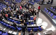 Het Duitse parlement debatteert over het vluchtelingenvraagstuk. In asielzoekerscentra hebben regelmatig geweldincidenten tegen christenen plaats. beeld EPA, Till Rimmele