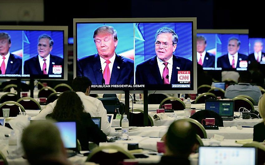 Trump en Bush. beeld EPA