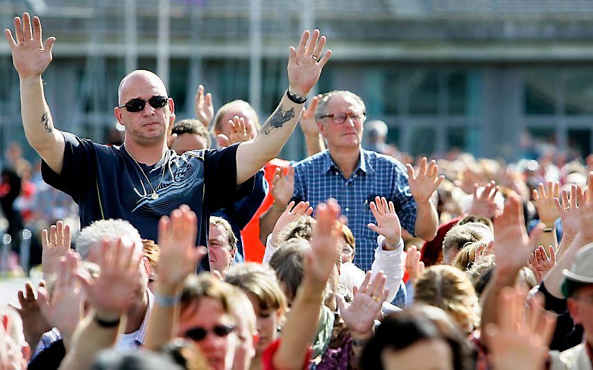 In 2007 vierden de de Nederlandse Pinkstergemeenten in het Olympisch Stadion in Amsterdam hun honderdjarig bestaan. beeld ANP, United Photos Robin van Lonkhuijsen