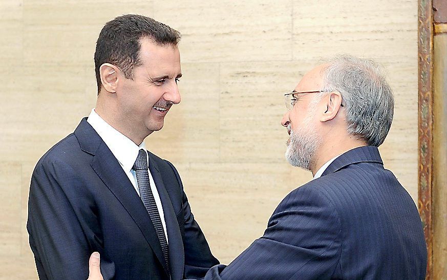 Assad (l.) en Salehi. Foto EPA