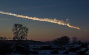 Foto genomen op 200 kilometer afstand van de exploderende meteoor van Tsjeljabinsk in februari 2013. beeld Wikimedia,