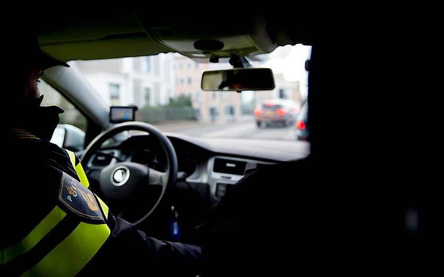 De politie in actie. beeld ANP, Koen van Weel