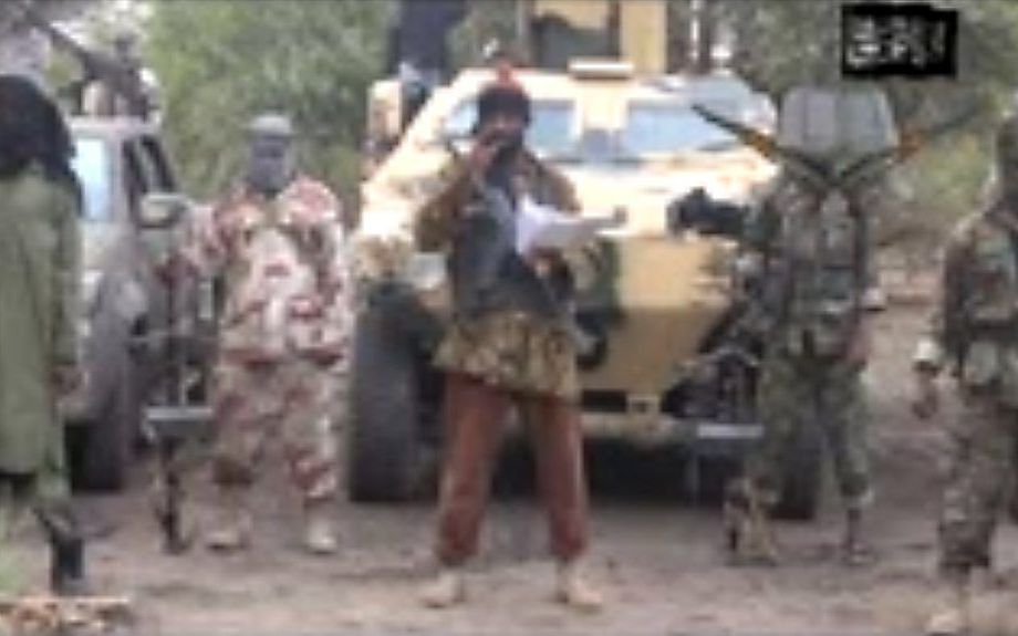 Videobeeld van de leider van Boko Haram, Abubakar Shekau (M). beeld AFP