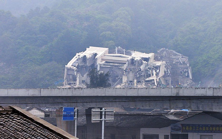 Een gesloopte Chinese kerk in Oubei, nabij de stad Wenzhou in de oostelijke provincie Zhejiang, waar de Chinese overheid vorig jaar al het kruis verwijderde. Beeld AFP