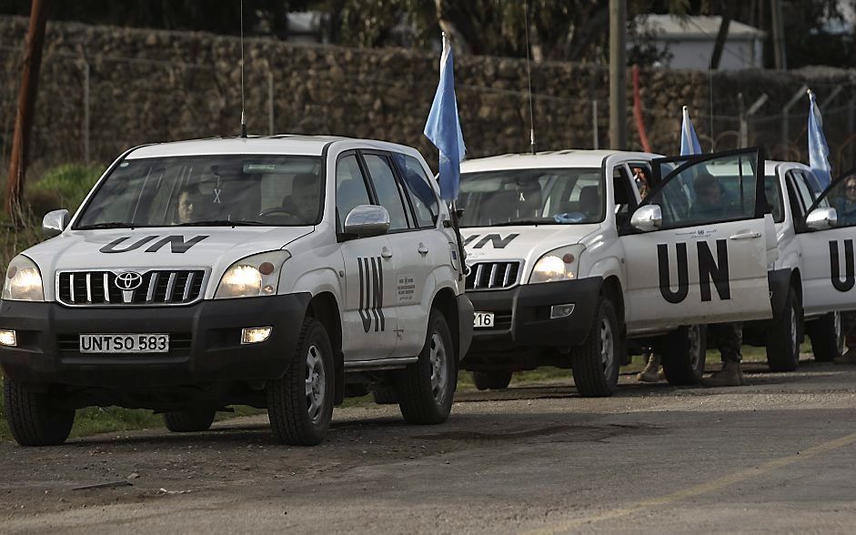 De 21 door rebellen gegijzelde VN-militairen in Syrië zitten vrijdag nog altijd vast. Volgens de rebellen zijn er geen gesprekken over hun vrijlating. Foto ANP