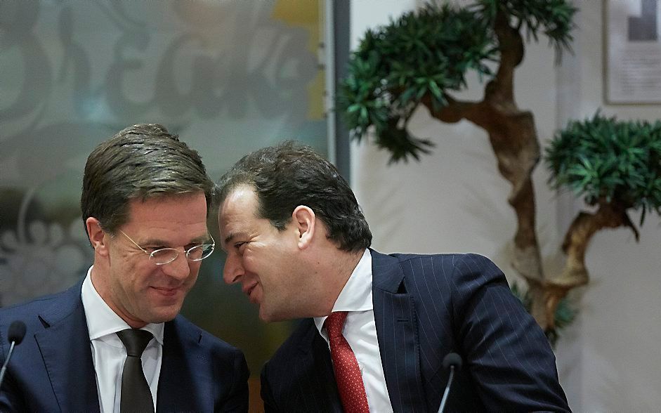 Rutte (l.) en Asscher. Foto ANP