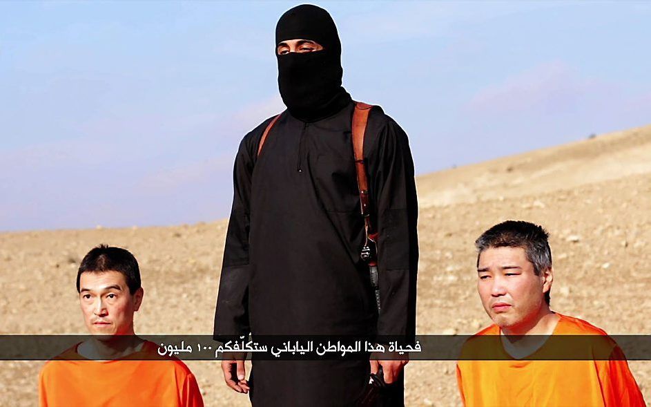 De Japanners Kenji Goto en Haruna Yukawa. beeld AFP