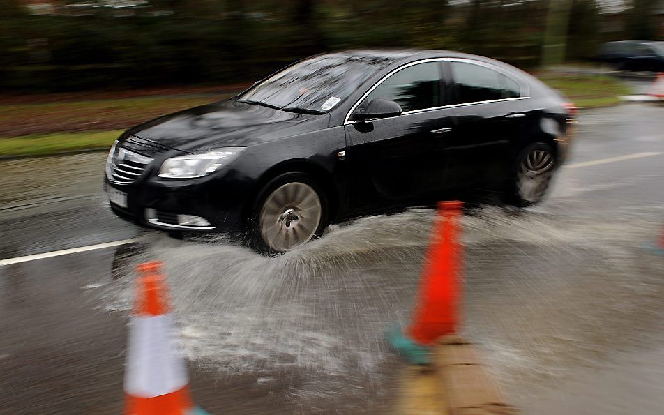 Regen en wind hebben zondag op veel plaatsen in Groot-Brittannië wateroverlast veroorzaakt.  Foto EPA