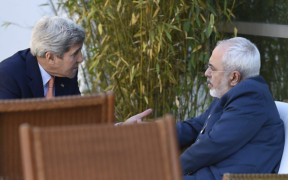 Kerry en Zarif. Beeld AFP