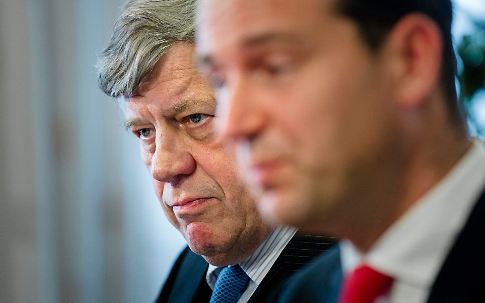 Opstelten (l.) en Asscher. Beeld ANP