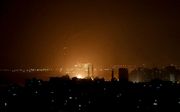 Gaza-stad tijdens een luchtaanval. beeld AFP