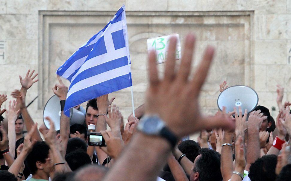 Protesten in Athene tegen de bezuinigingen. Foto EPA