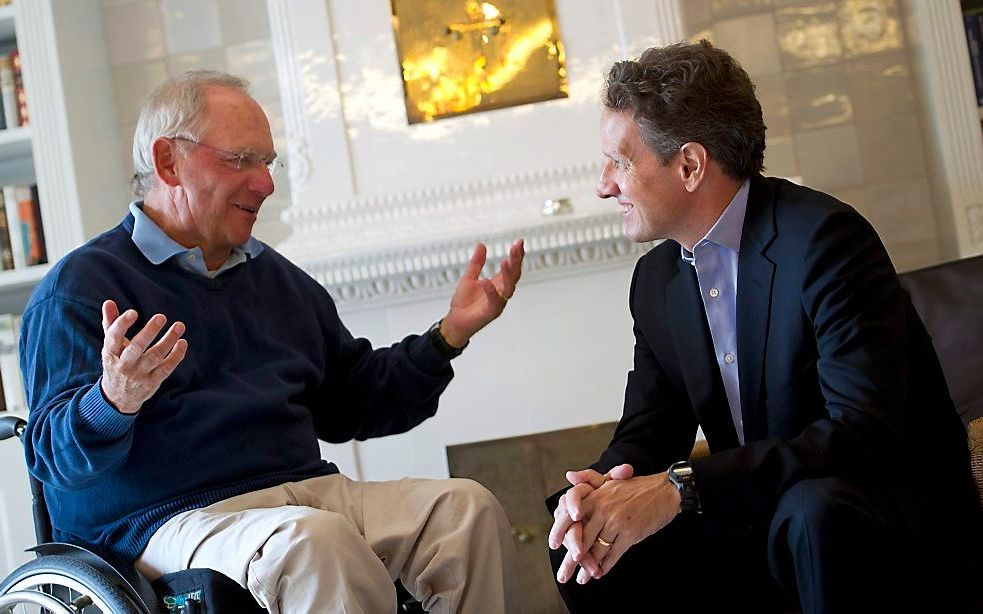 Schäuble (l.) en Geithner. Foto EPA