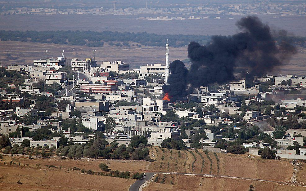 Het Syrische dorp Jbatha Al-khashab, 45 kilometer ten zuiden van Damascus, gezien vanuit Israël. Foto EPA