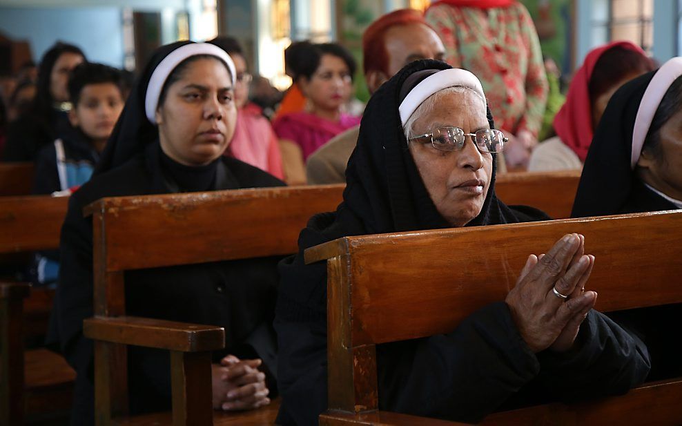 Kerkgangers in India. beeld EPA, Jaipal Singh