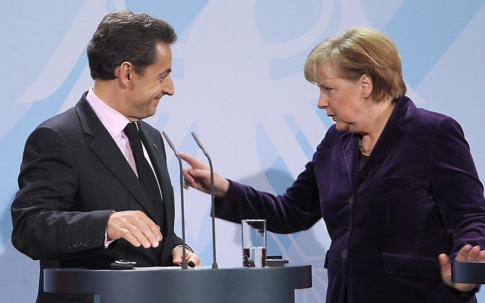 Merkel en Sarkozy zetten Grieken verder onder druk.  Foto EPA