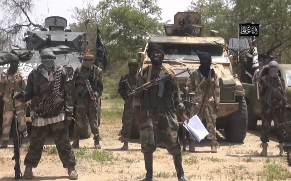 MAIDUGURI. Strijders van de Nigeriaanse islamistische groep Boko Haram, op een eigen video uit juli 2014. Boko Haram heeft al verschillende steden en dorpen in het noorden van het land veroverd. beeld AFP