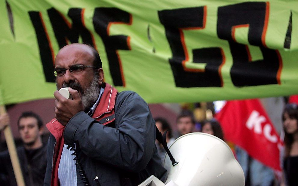 Menno Snel van pensioenuitvoerder APG Groep wordt de nieuwe Nederlandse bewindvoerder bij het Internationaal Monetair Fonds. Op de foto een protestbijeenkomst tegen het IMF. Foto EPA