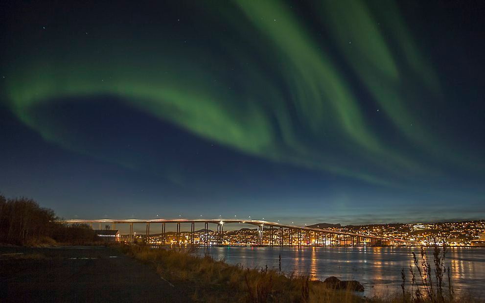 Zicht op de stad Tromso in Noord-Noorwegen.  beeld EPA