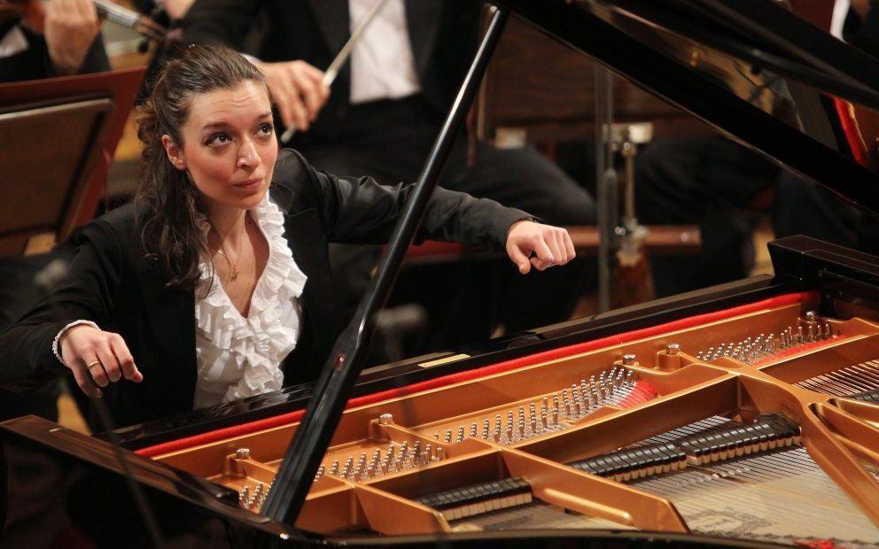 De Russische pianiste Yulianna Avdeeva heeft gisteren het Chopinconcours in Warschau gewonnen. Foto EPA