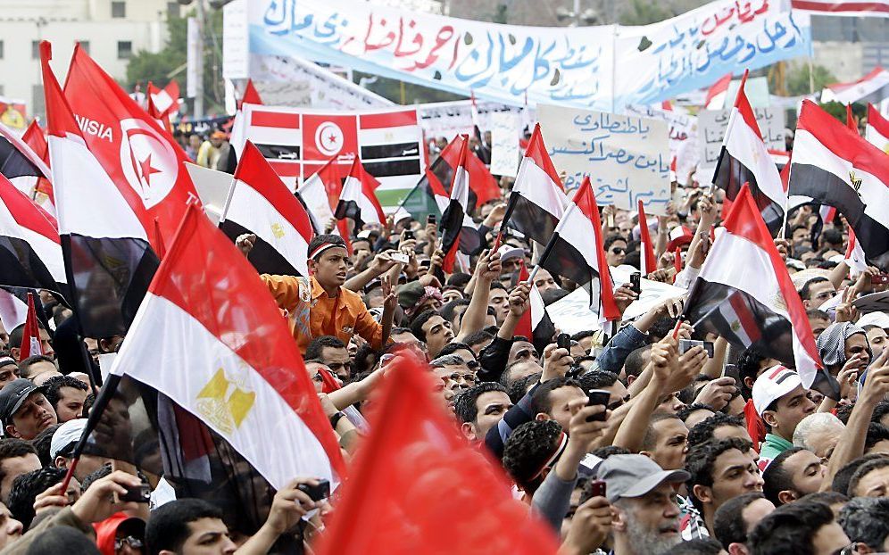 Ook na het vertrek van Mubarak is het met de demonstraties in Caïro nog niet afgelopen. De grote vraag is welke rol de islamistische krachten in het land zullen gaan opeisen, vooral na de verkiezingen van september. Foto EPA