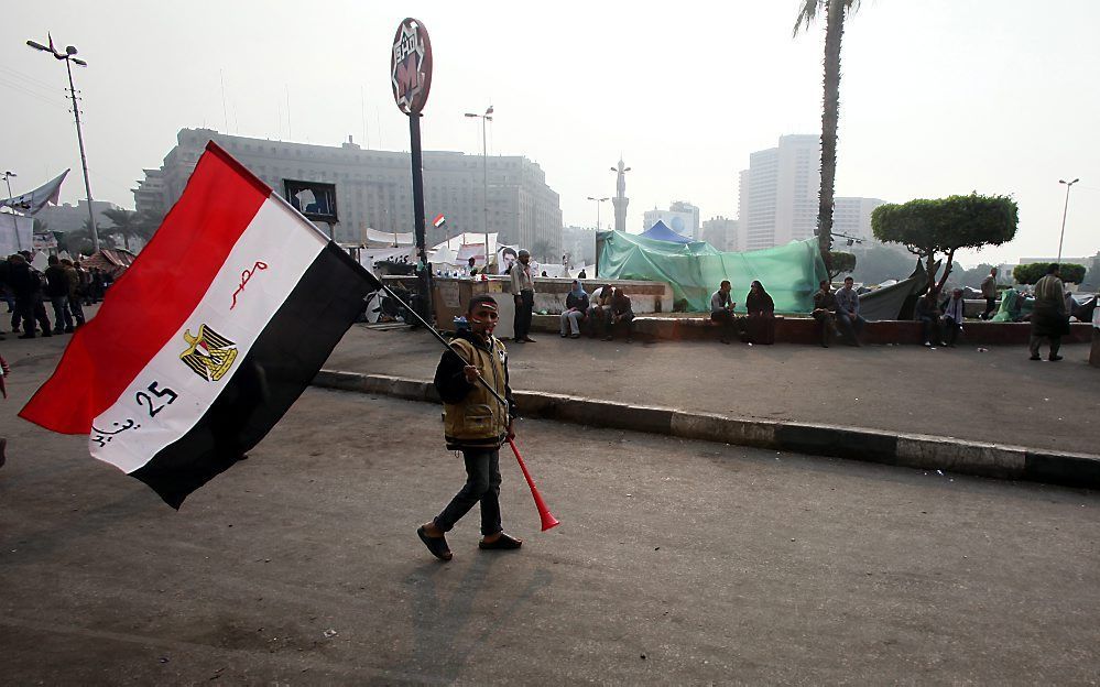 Jongen met Egyptische vlag.  Foto EPA